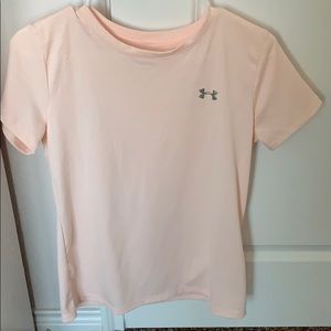 Light Pink Under Armor Athletic atop
